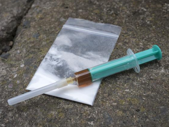 <p>Library photo showing heroin and a syringe</p>