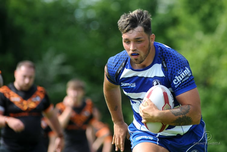 Action from the season-opening clash between Devon Sharks and Torfaen Tigers on Saturday.