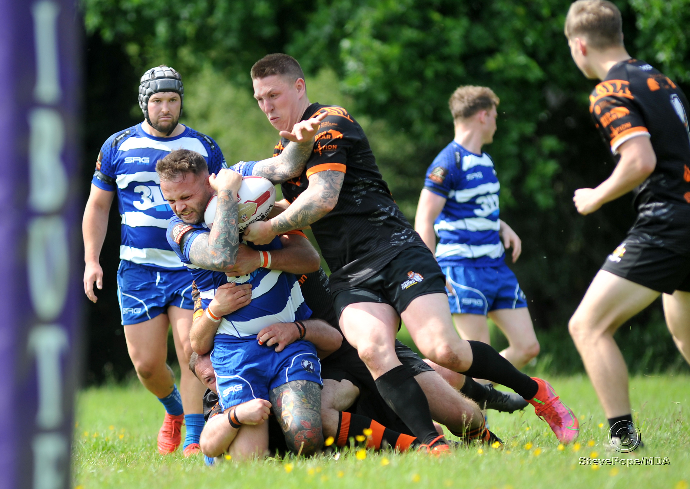 Action from the season-opening clash between Devon Sharks and Torfaen Tigers on Saturday.