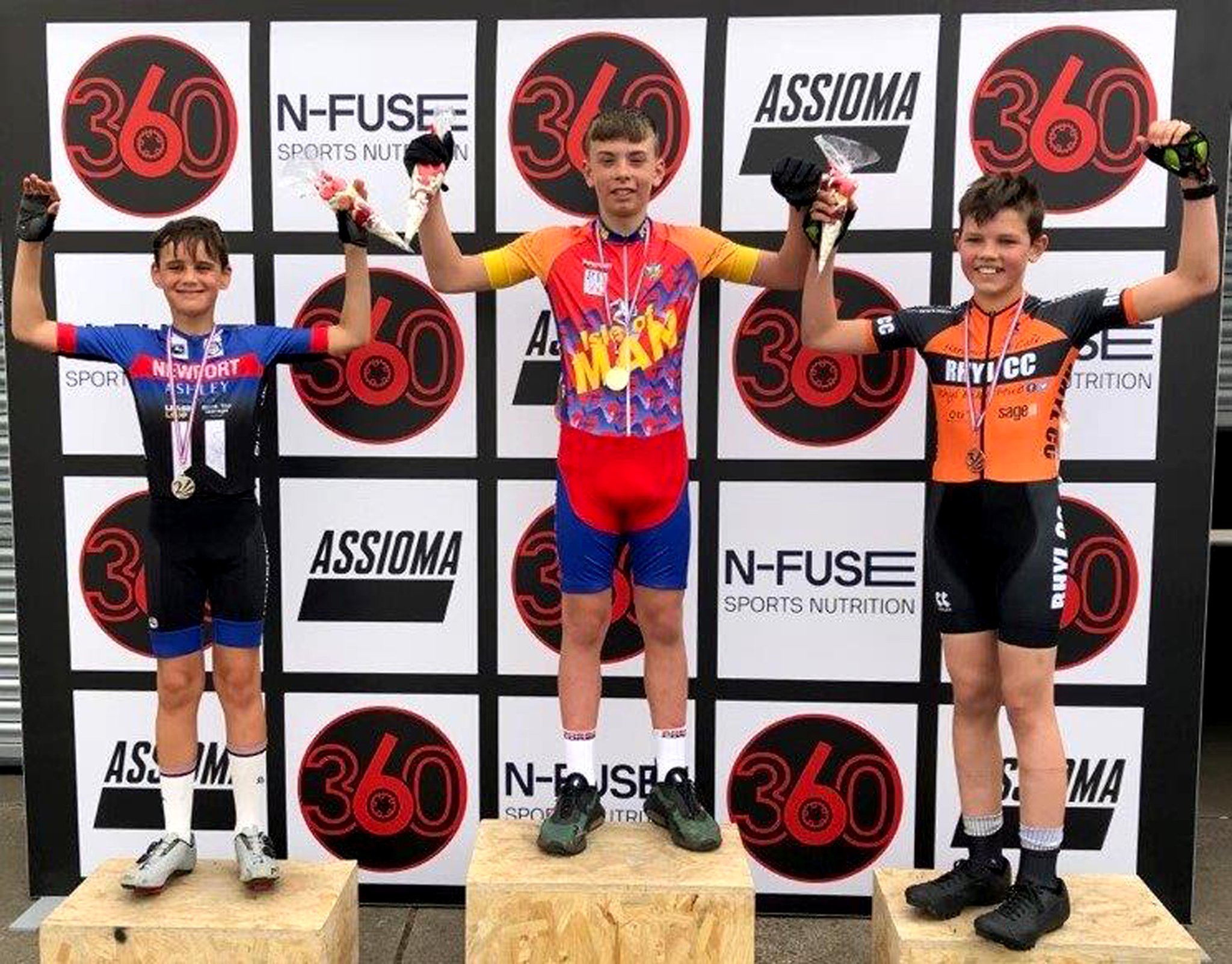 Team RL360’s Daniel Minay is flanked by James Trippier (left) of Newport Shropshire CC and Joshua Hughes (Rhyl CC) on the podium for winning C boys race at Oulton Park