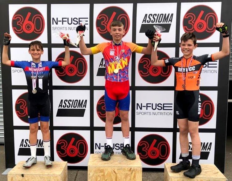Team RL360’s Daniel Minay is flanked by James Trippier (left) of Newport Shropshire CC and Joshua Hughes (Rhyl CC) on the podium for winning C boys race at Oulton Park