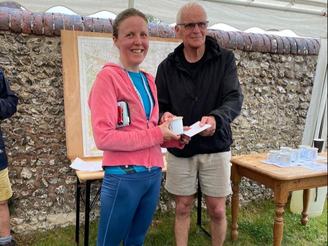 Sarah Hurford receives her first lady award at the Cocking 10k