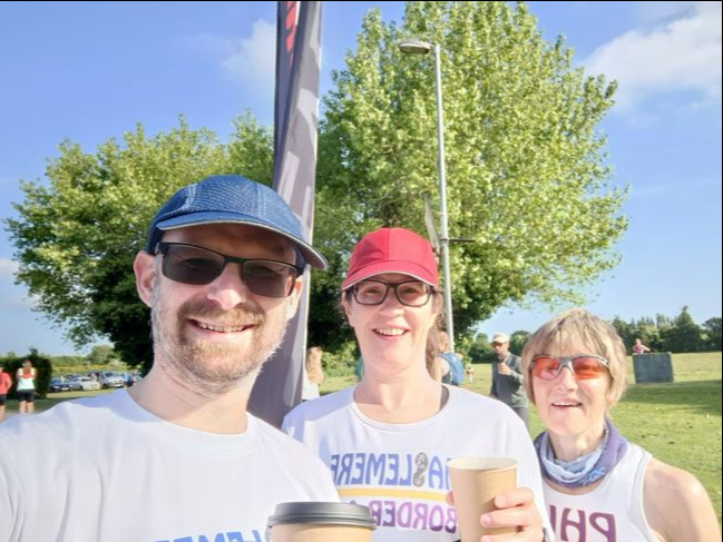 Tom and Louise Bampton with Philomel Bennett after the Thorney Island half marathon
