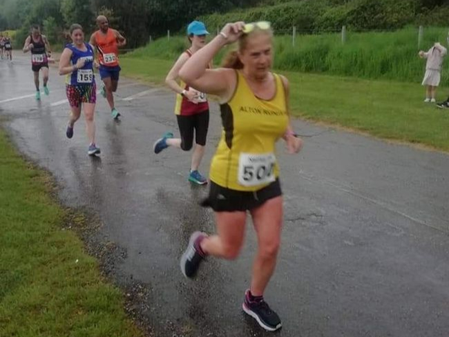 Kathryn Powell contending with the rain at the Netley 10k. Picture by Jenny French