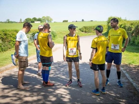 Alex Hall giving a team talk: ‘Run as fast as you can, guys...” Picture by Douglas Maclean