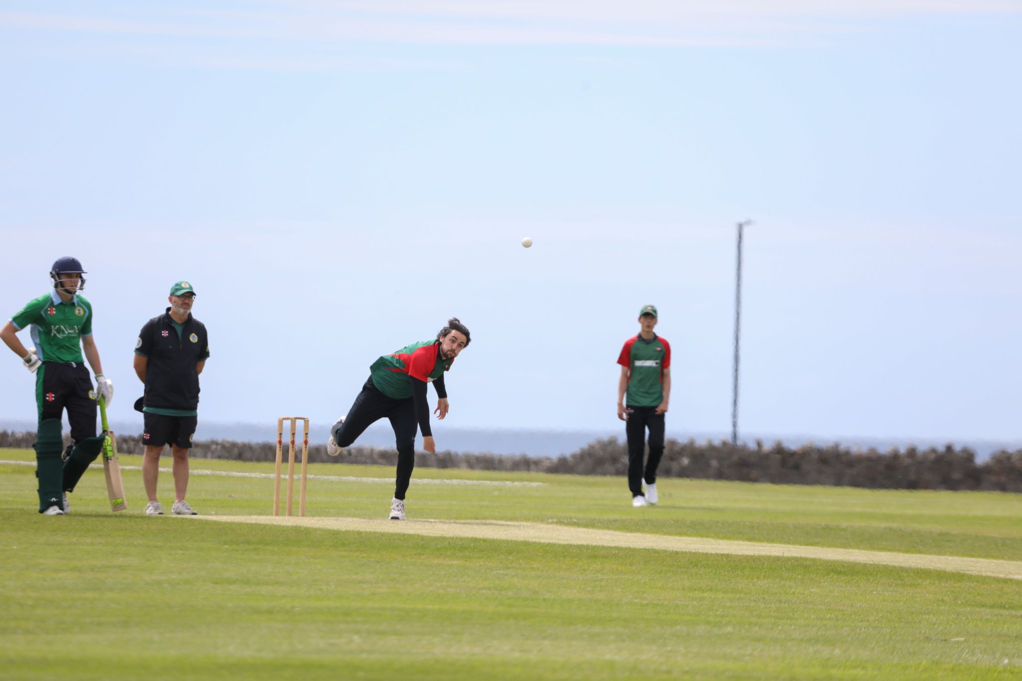 Dan Williams sends in a delivery for Castletown during their narrow defeat against Ramsey at King William’s College (CS220528(5))