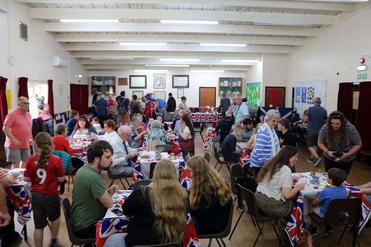 Residents, councillors and council staff joined together in the Community Hall in Kingsteignton to enjoy a cream tea served by the ladies from the Post Meridian WI and Councillor Julie Scagell. Picture: Shirley Simmons