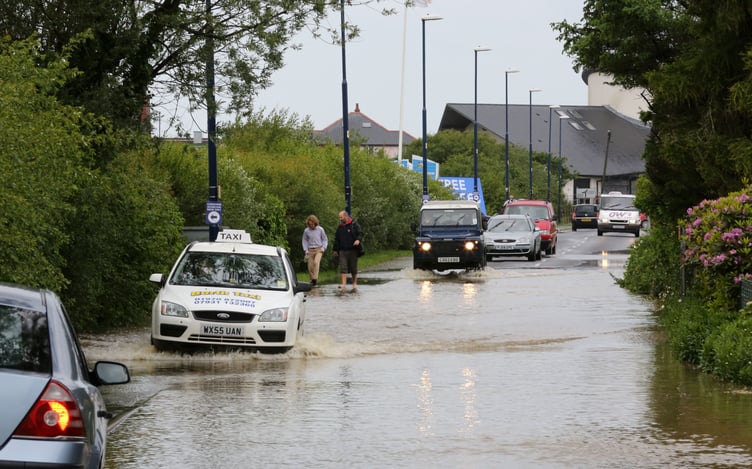 Flood water on the road heading to Borth