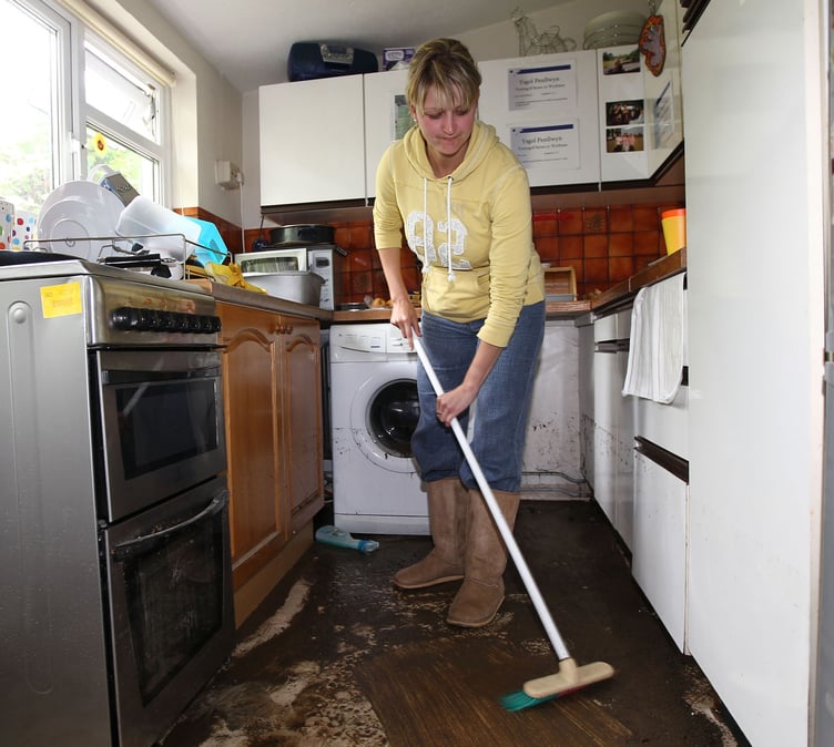 The clean up begins as waters subsided