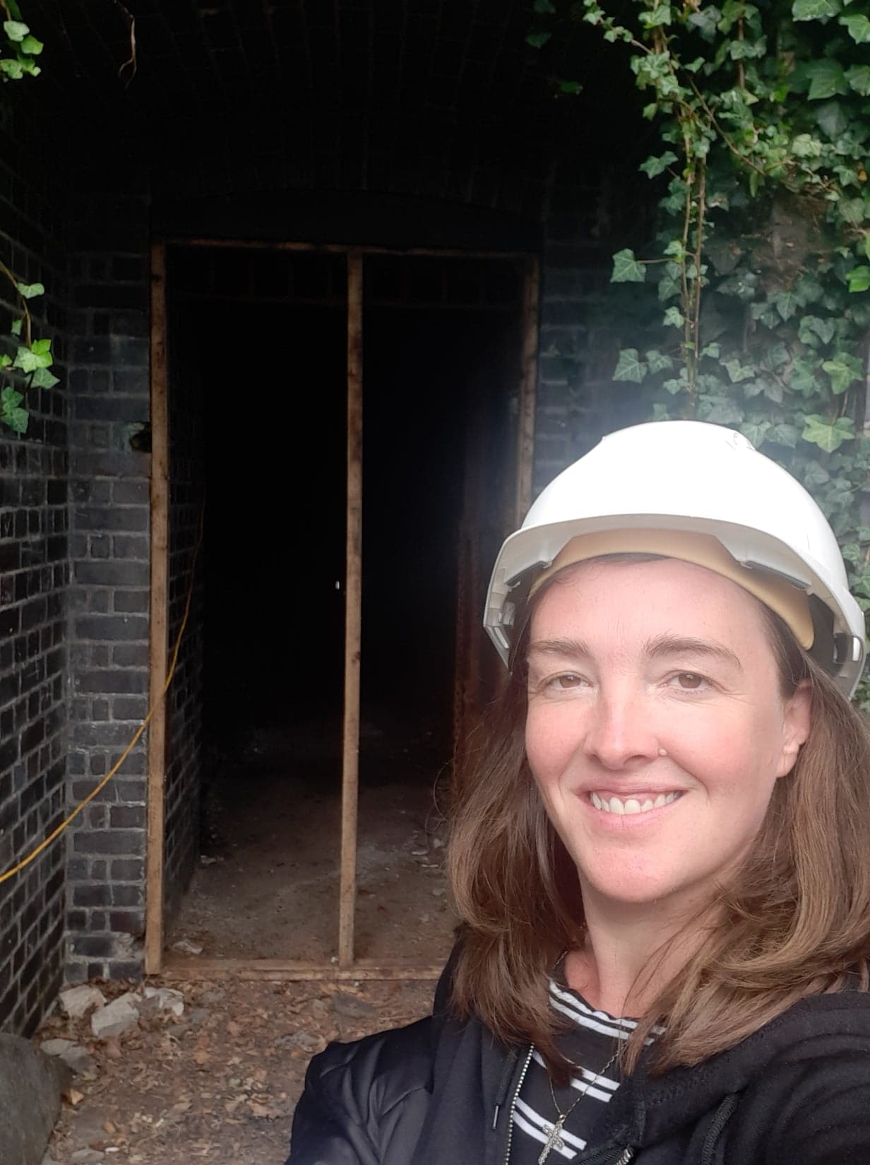 Julie at the entrance to the tunnel on Llanbadarn Road. Below left: Historian Will Troughton with tunnel plans