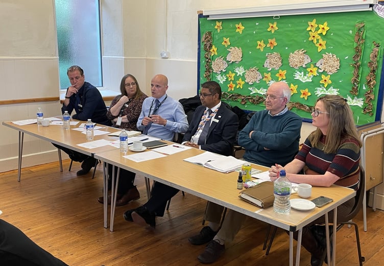 Bosses from rail company GWR pledging action on cancellations of trains from Bere Alston at a recent public meeting – Bere peninsula borough councillor Angela Blackman, right, says action still hasn’t been taken.