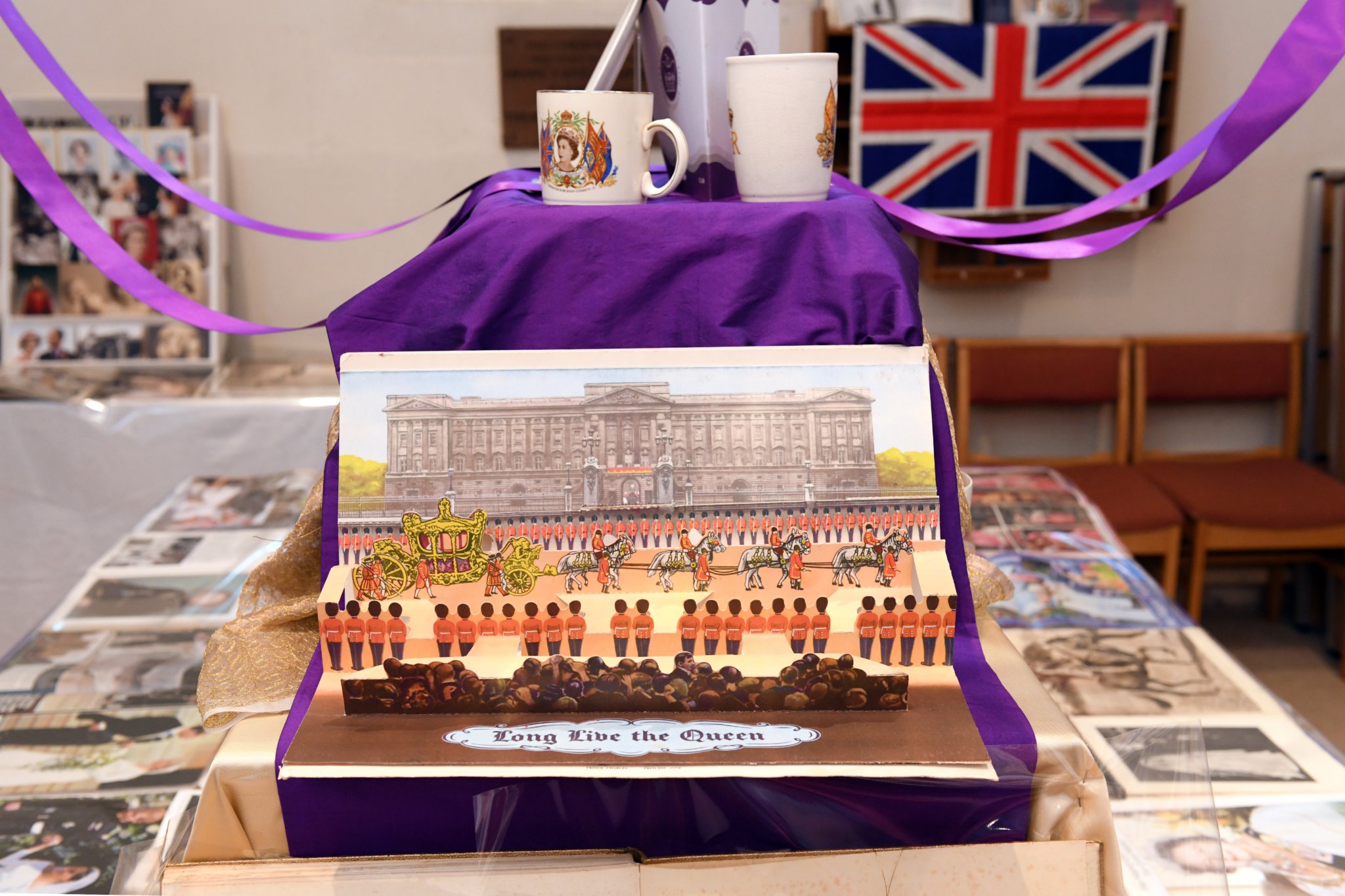 PLATINUM JUBILEE MRW 2/6/2022
Many events were held across East Hampshire on Thursday 2nd June 2022 from Fetes to Festivals, and Picnics to Beacons being lit to celebrate the reign of Her Majesty The Queen for 'The Queen's Platinum Jubilee 2022'
Stunning ! - the truly amazing collection of 'Royal' mementoes owned by curate Reverend Alison Waterhouse
Picture: Malcolm Wells
Professional Photographer