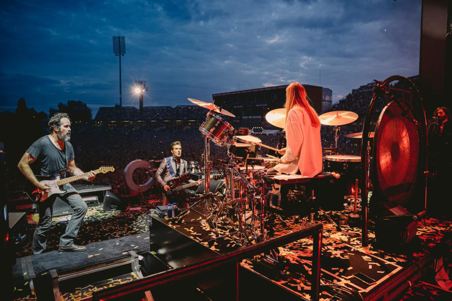 Katie Roberts on stage with the Killers in Manchester