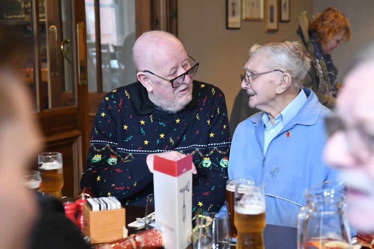 A festive lunch for members of the ‘Gold Club’ organised by Southern Befrienders - pictured is Alex Dawson (left) and Jim Oates (right)