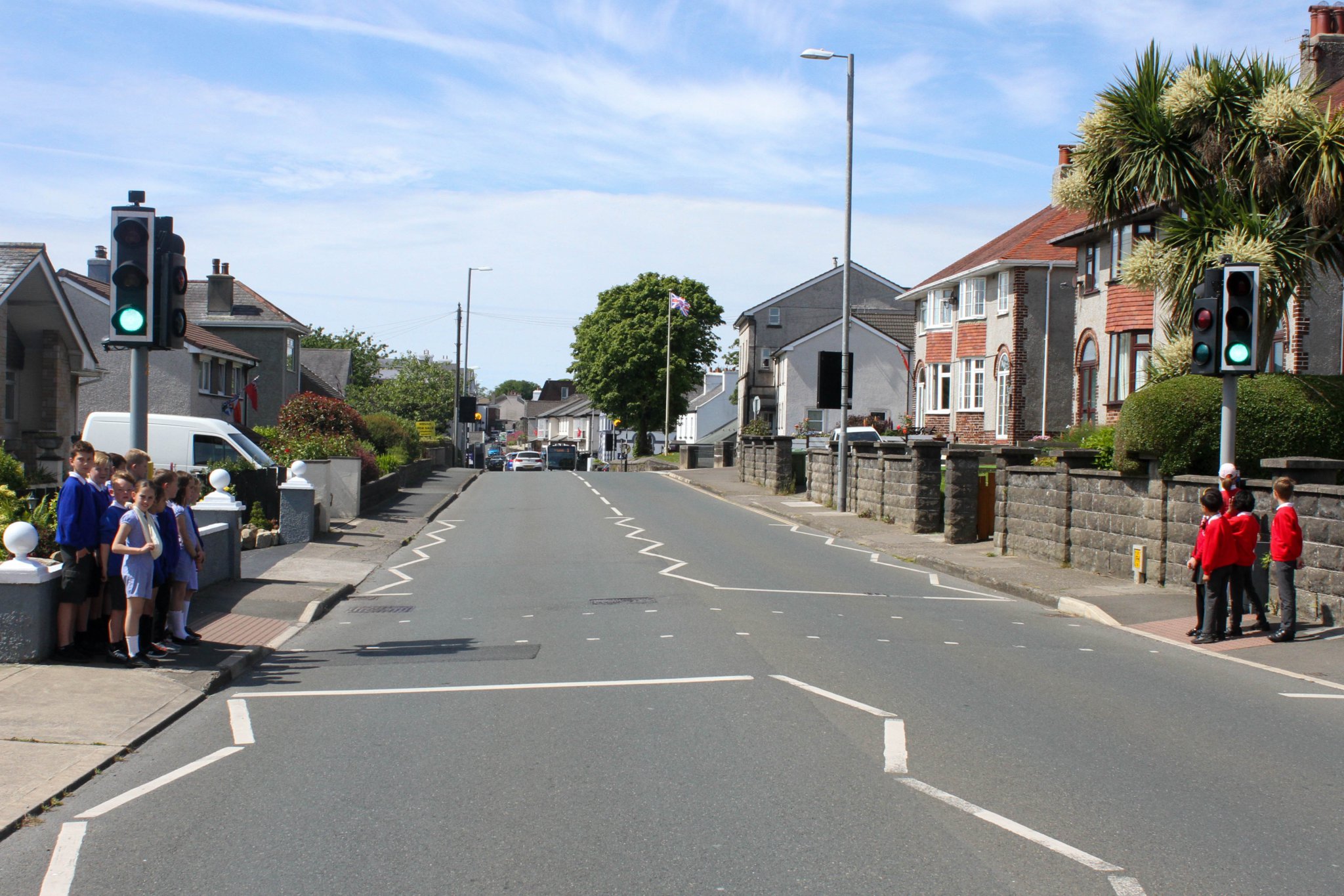 School children from both Ashley Hill Primary School & Onchan Primary School using the pelican crossing in Onchan. Photo by Callum Staley (CJS Photography).
