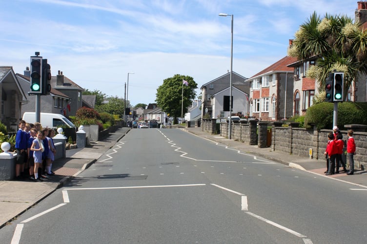 School children from both Ashley Hill Primary School & Onchan Primary School using the pelican crossing in Onchan. Photo by Callum Staley (CJS Photography).