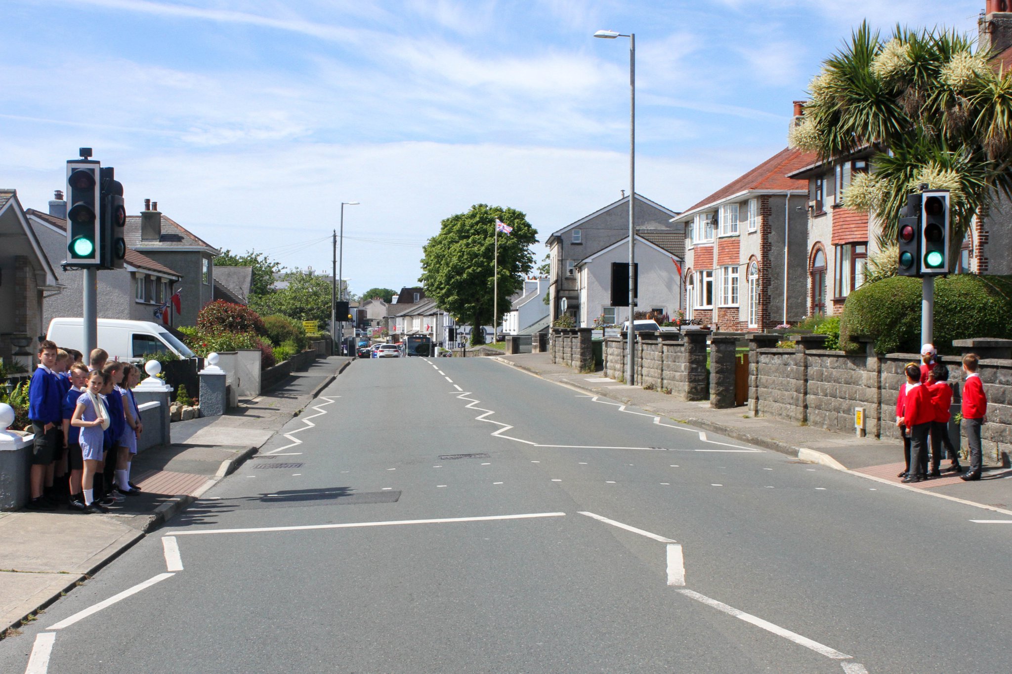 School children from both Ashley Hill Primary School & Onchan Primary School using the pelican crossing in Onchan. Photo by Callum Staley (CJS Photography).