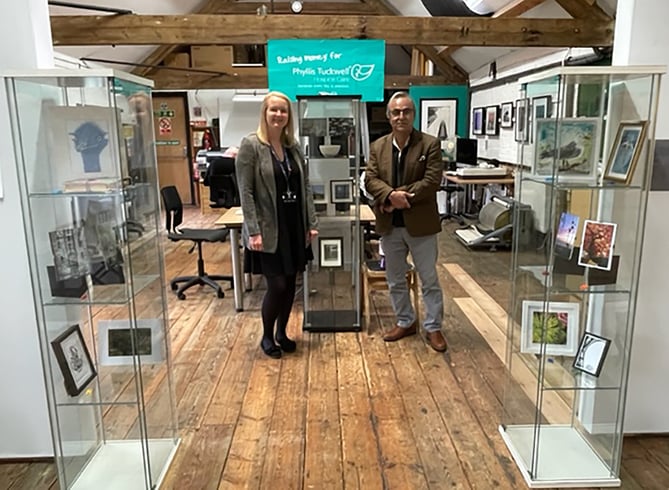 Phyllis Tuckwell community fundraiser Jenny Newman with Kiln Photo’s Abb Abbas-Nazari