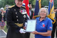 Families gather to salute the island’s armed forces