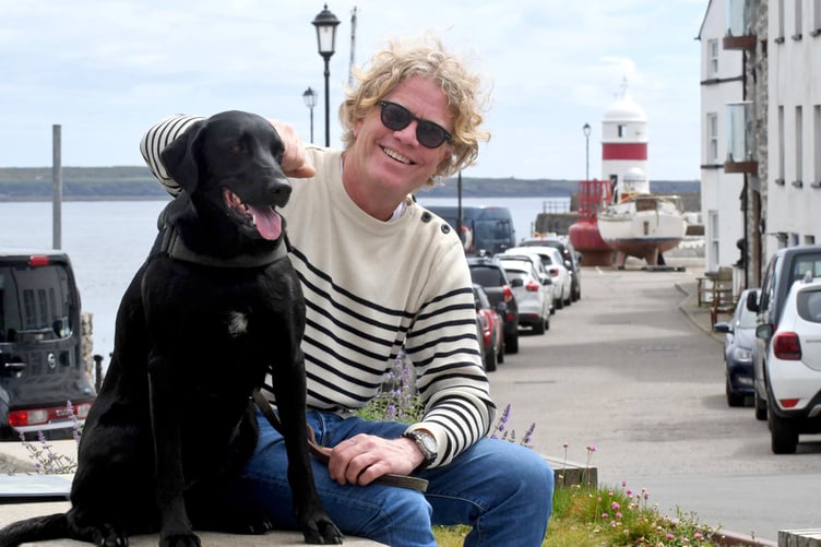 Yacht designer Jeroen Wats with Quattro the dog -