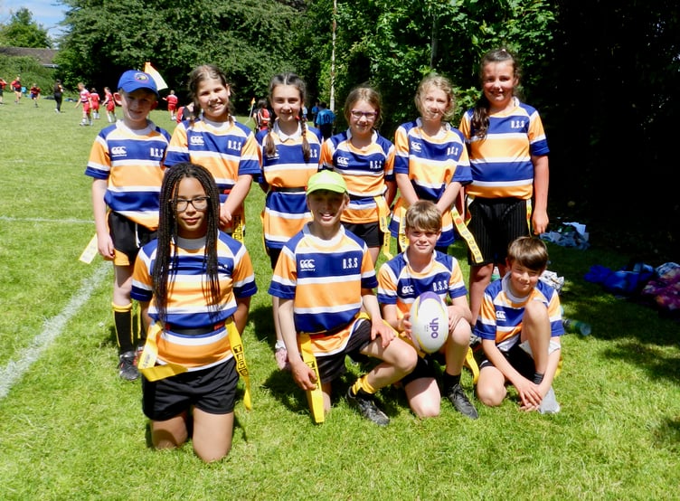 Children from Brampford Speke took part in the tag rugby at Crediton Rugby Club. NP 200622 04