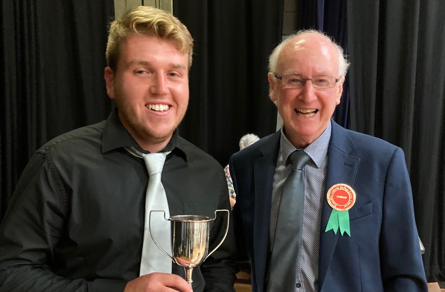 Brian Hughes presenting the £500 Colin Jones Scholarship to Tomos Heddwyn Griffiths of Trawsfynydd