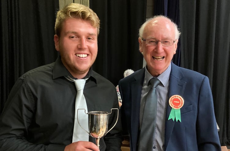 Brian Hughes presenting the £500 Colin Jones Scholarship to Tomos Heddwyn Griffiths of Trawsfynydd