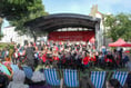 The sun shines on the brass bands
