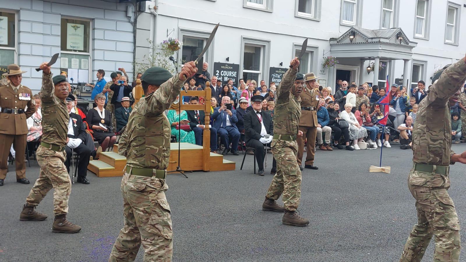Members of the regiment perform with their Khukuris