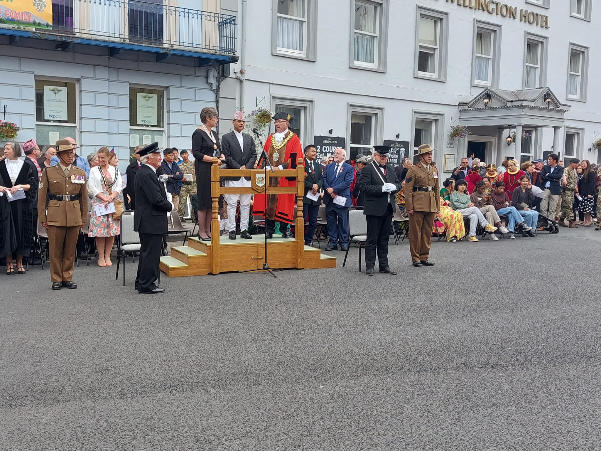 Deputy Lord Lieutenant Ceri Havard with Nepal Ambassador Gyan Chandra Acharya and Cllr David Meredith