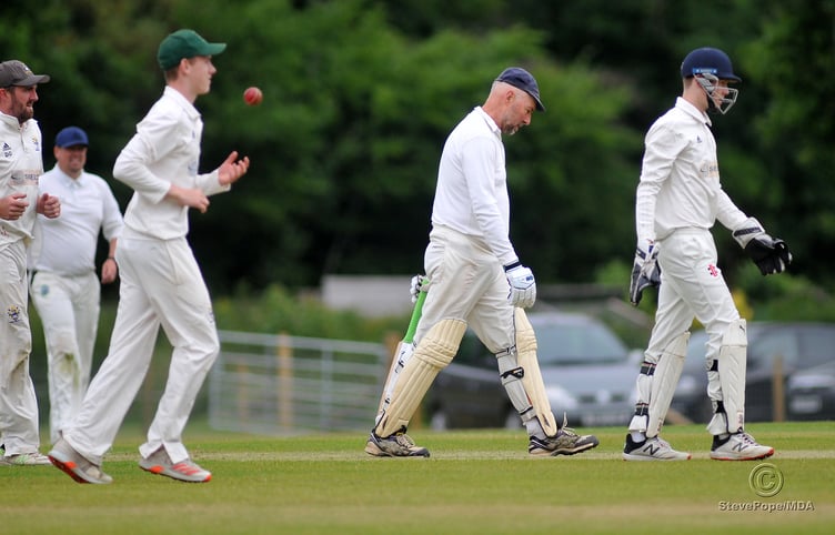 Action from the Devon Cricket League B Division clash between Bovey Tracey second XI and Dartington & Totnes on Saturday.