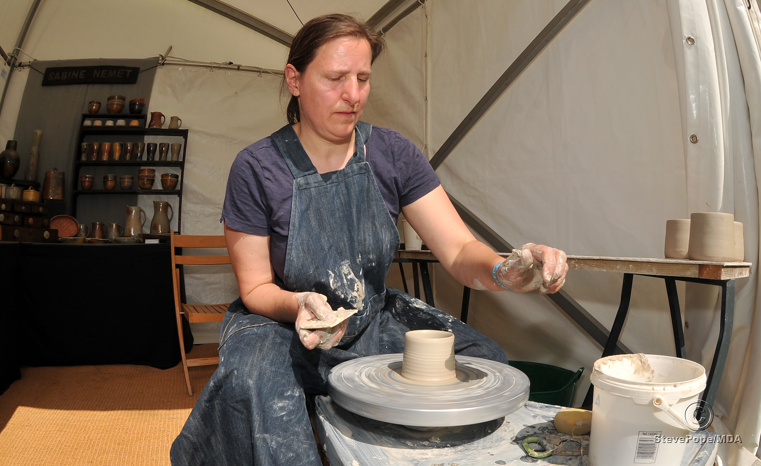 Photo: Steve Pope. MDA170622A_SP006 Bovey Tracey Craft Festival. Potter Sabine Nemet from Moretonhampstead