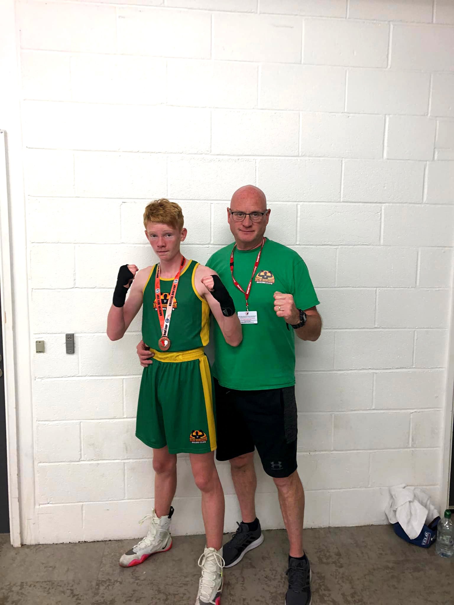 New Horizons junior boxer Sonny Finch pictured with his Bristol Box Cup bronze medal alongside his head coach John Cain
