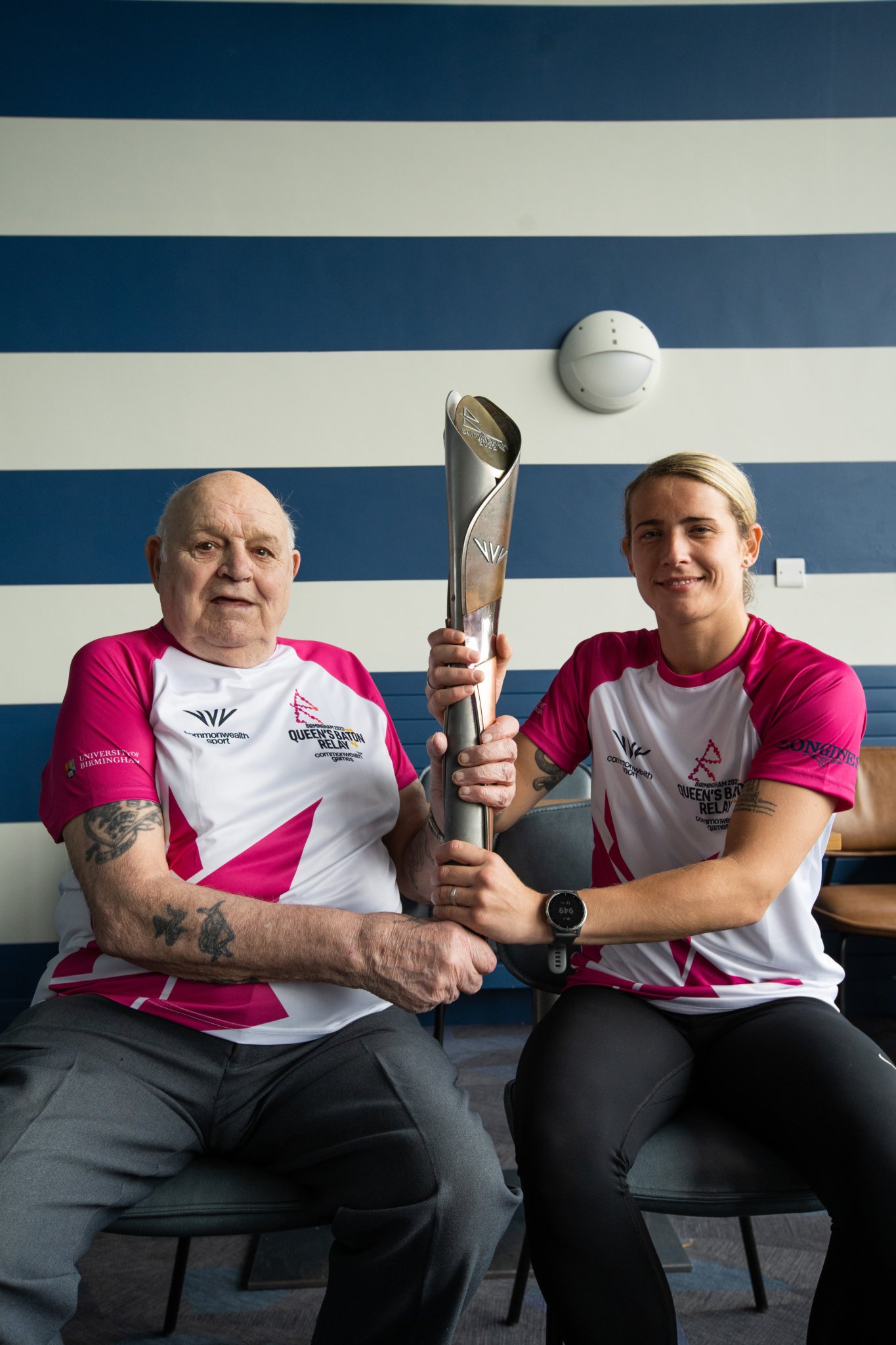 Jade Burden is pictured holding the Queen’s Baton during its recent visit to the island with John Osborne, who was the very first Isle of Man boxer to compete at a Commonwealth Games back in 1958. Manx ABC fighter Burden will become the first female boxer to represent the island at the Games when she heads to Birmingham at the end of July