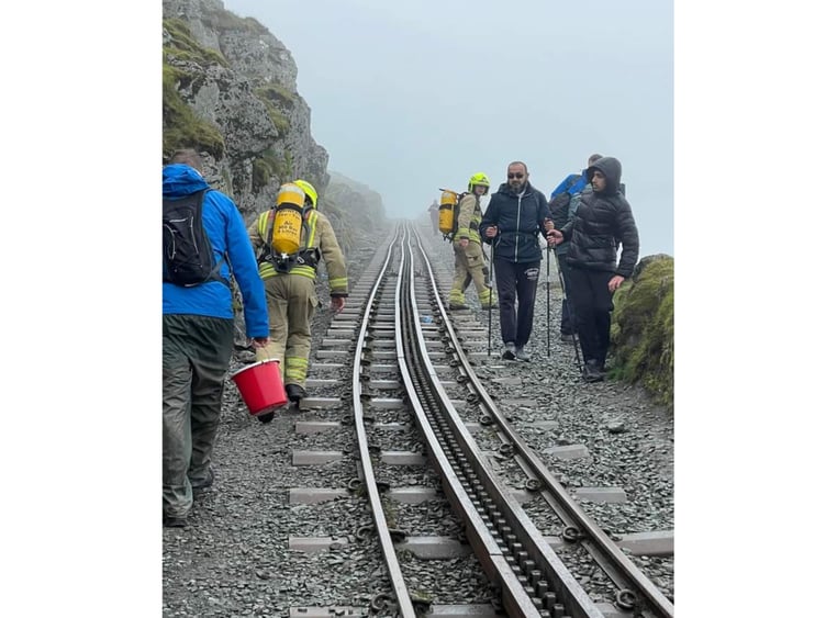Walking past the mountain railway
