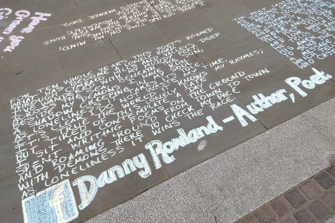 The full poem was on full display for all to see in the town centre until the evening shower washed it away last Wednesday.