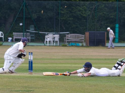 Wicketkeeper Ben Wish runs out Lewis Dunford