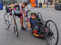 <p>St Andrew’s Carolyn Wickham with Rachel Morris at the finish line</p>