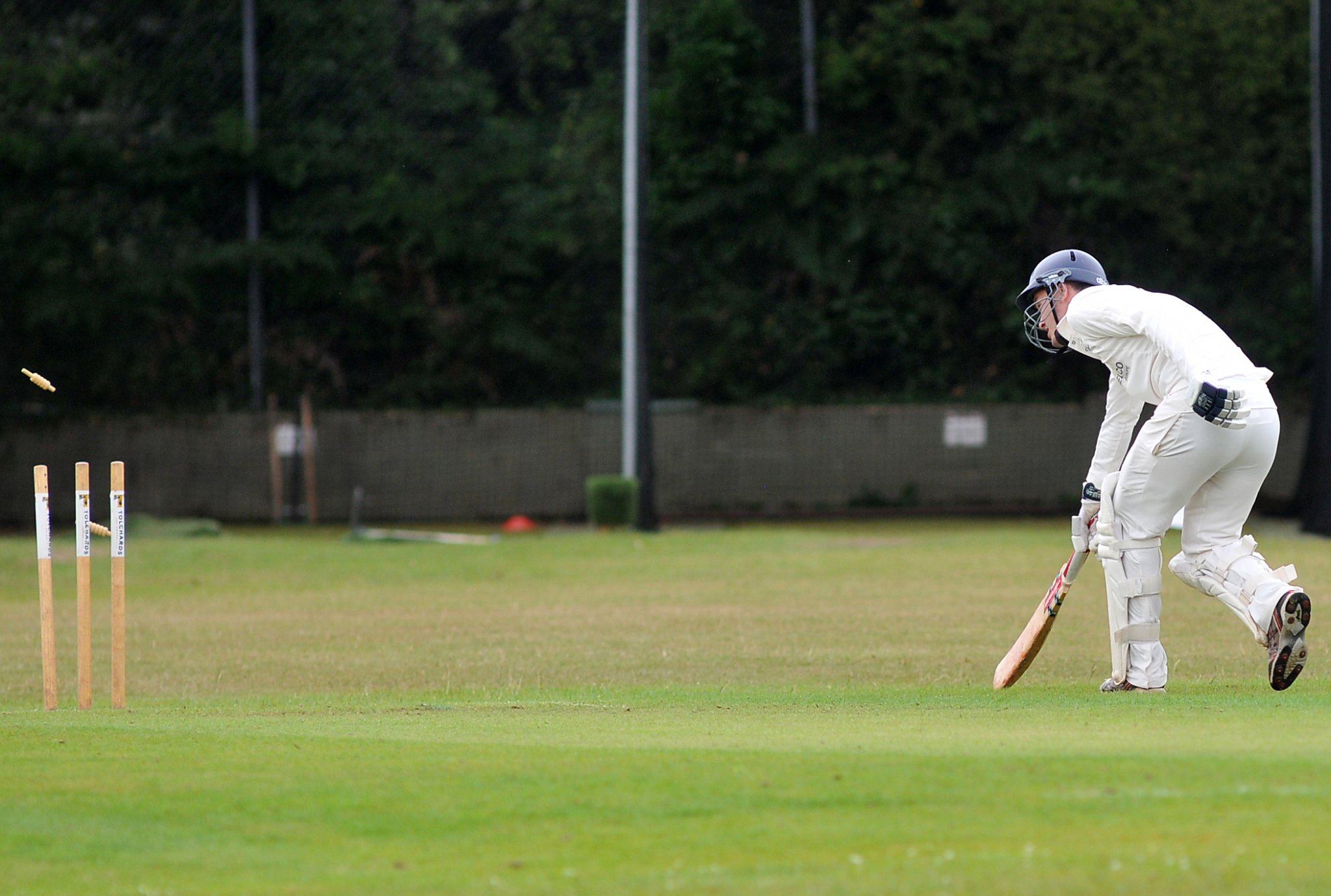 Photo: Steve Pope MMDA020722E_SP005
Tolchards Devon Cricket League B Division. Bovey Tracey 2nd XI versus Bridestowe 1st XI. Bails fly but Bovey's Ben Steer makes it to the crease in time