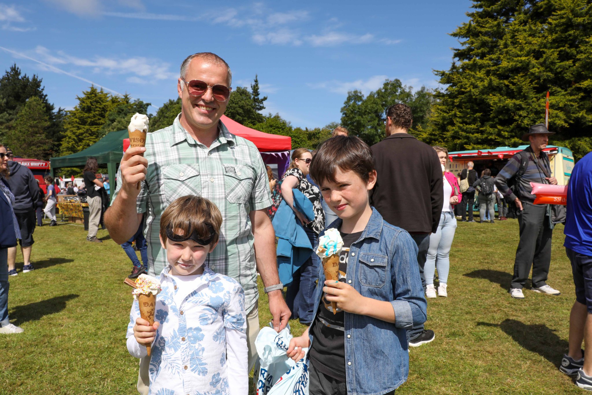 Cain Family having an Ice Cream at Tynwald Day. Photo by Callum Staley (CJS Photography)