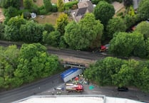 Woman safely rescued from car crushed by HGV at Wrecclesham bridge
