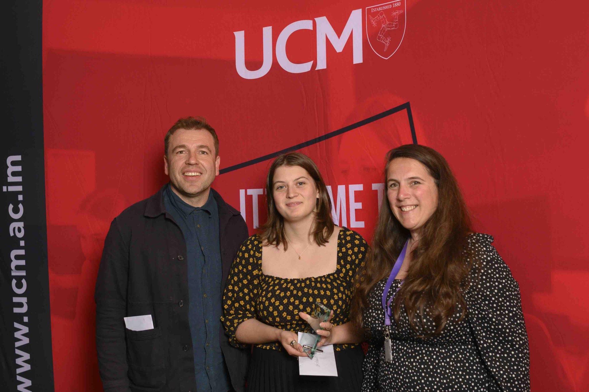 Miles Petit from Noa Bakehouse (left) with UCM principal Jesamine Kelly and art design media and music student Isabel Clarke