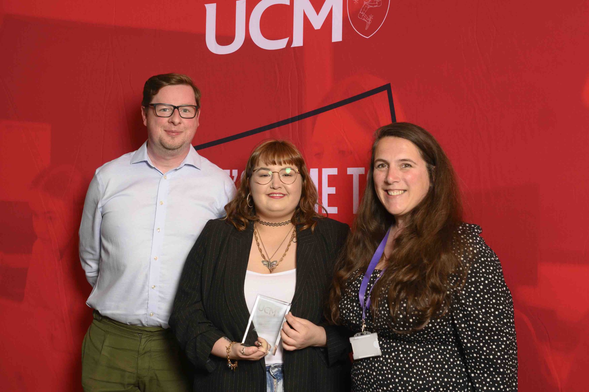 Martyn Cain from the Art Council with art design media and music student Molly Hansbury-McAleer and UCM principal Jesamine Kelly