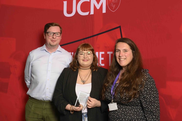 Martyn Cain from the Art Council with art design media and music student Molly Hansbury-McAleer and UCM principal Jesamine Kelly