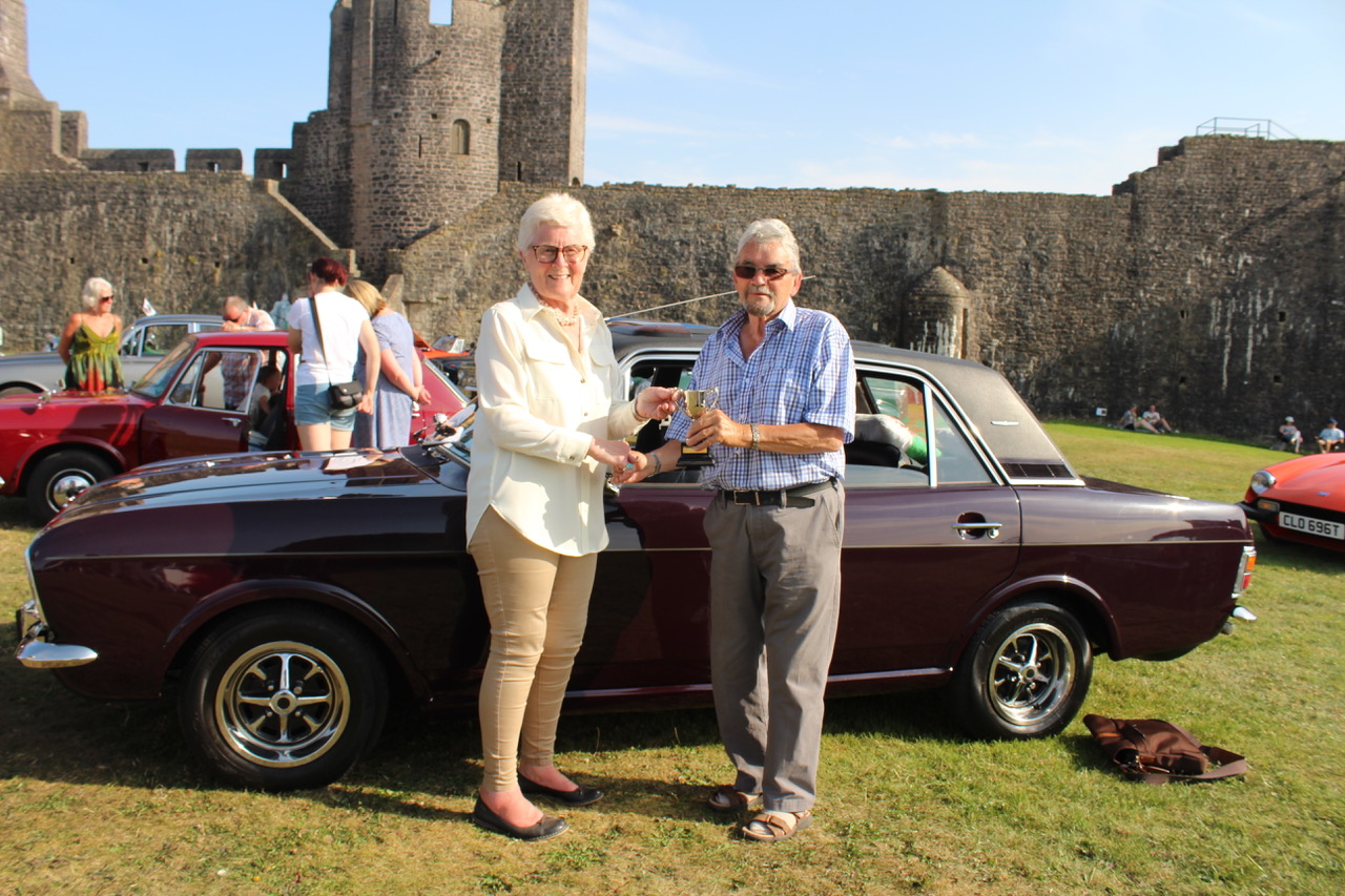 Town Walls Trust trustee Daphne Bush with Don Yeats, of Carmarthen, with his 1970 Ford Cortina 1600e.