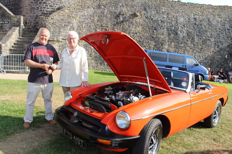 T-Reg MGB owner Andrew Bell, of Pembroke Dock with Pembroke Town Walls Trust trustee Daphne Bush.