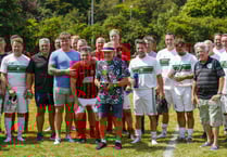 Football legend kicks off vets game