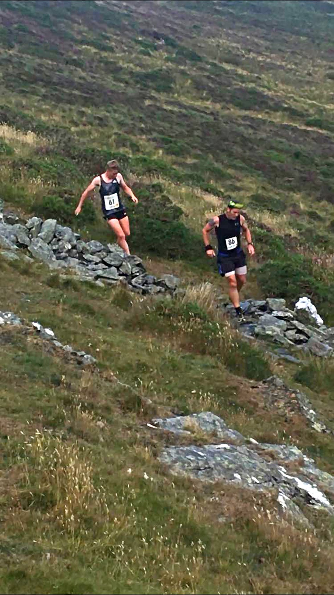 Neil Brogan on the difficult descent of Carraghan, followed by Dominic Dunwell (Photo: Domenico Galante)