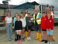 Pupils present £2,000 to lifeboat station