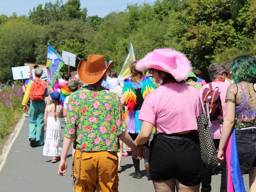 Holding hands at the Pride Parade